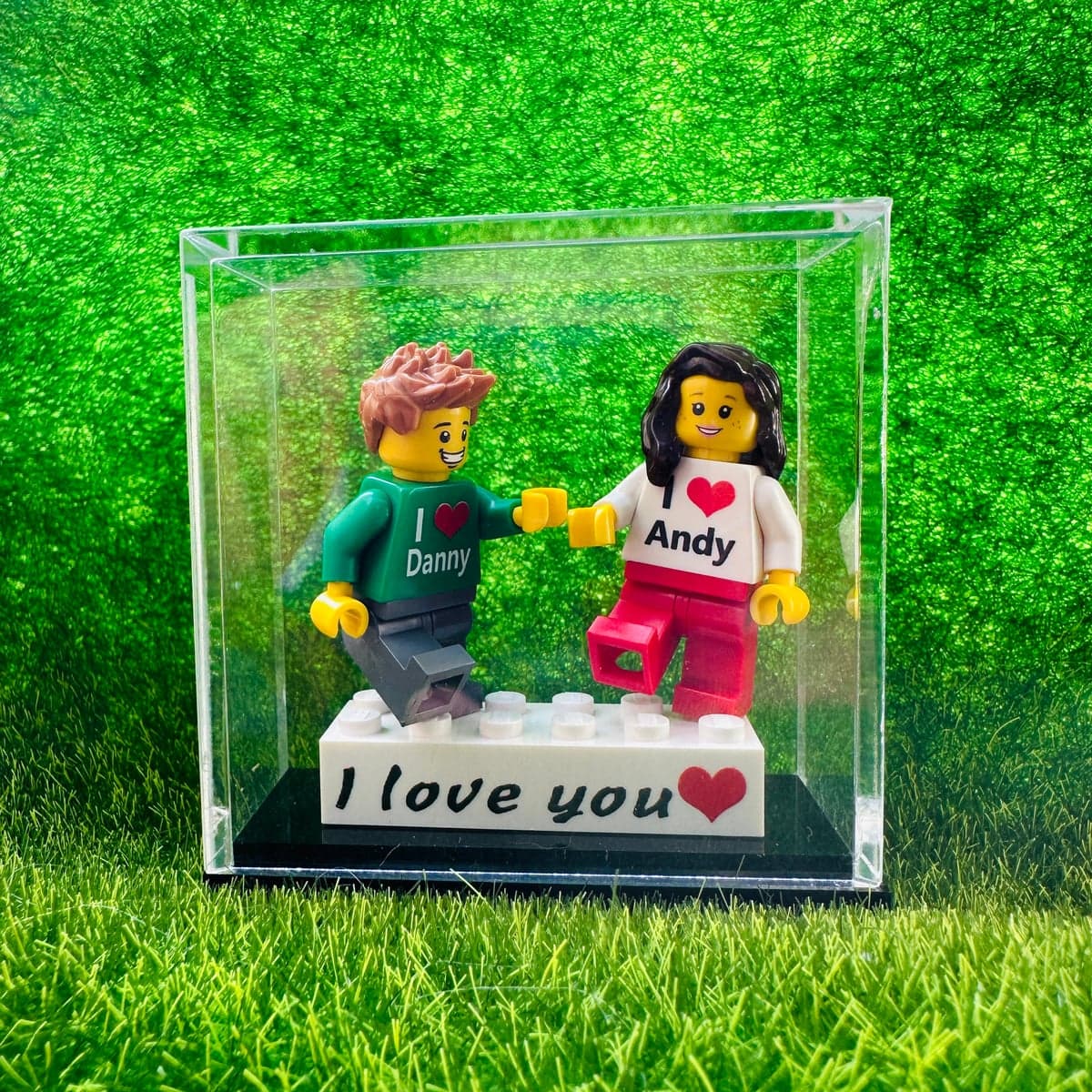 Two Personalized Couple Brick Figures with Display Case — photographed example with personalized names